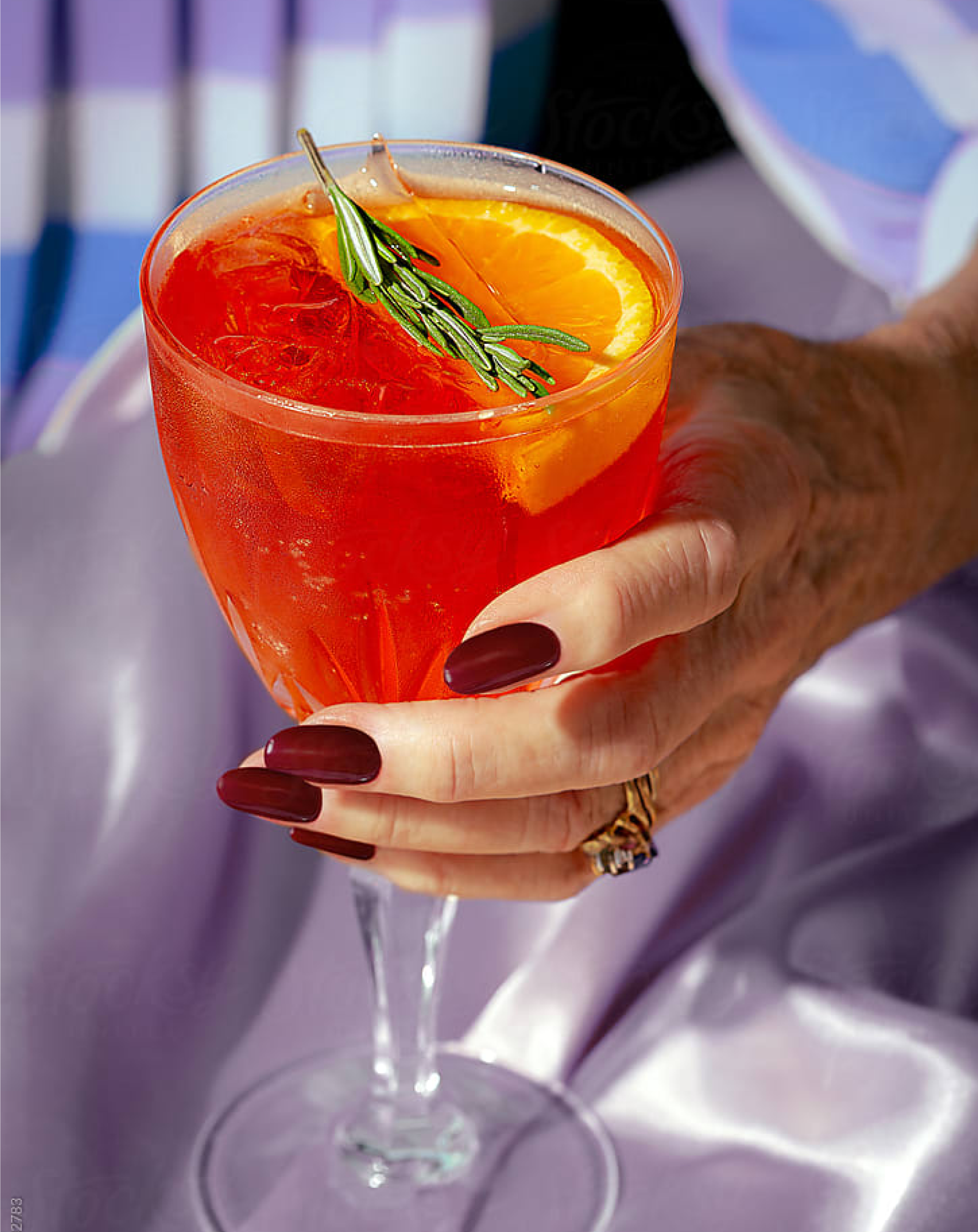 Person sitting on floor working on laptop