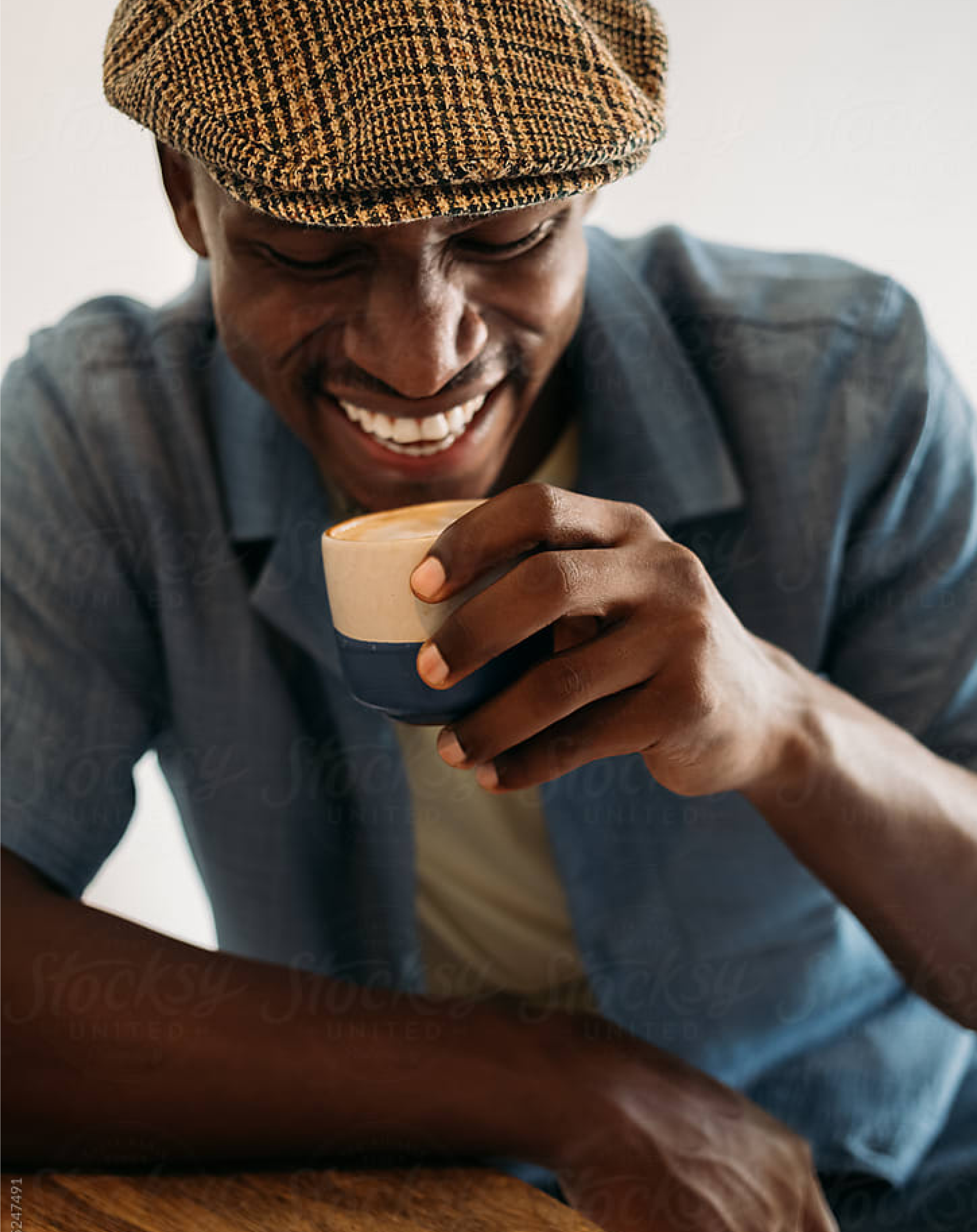 Person sitting by window working on tablet
